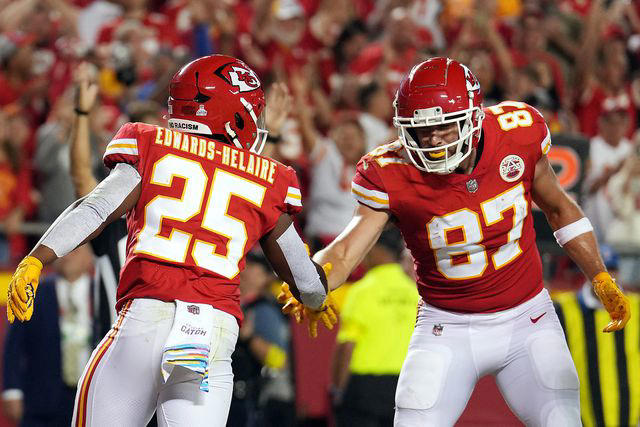 Jason Hanna/Getty Clyde Edwards-Helaire (left) and Travis Kelce in 2022