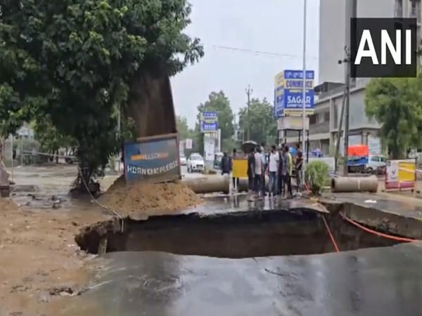 gujarat rains: massive sinkhole formed on road amid heavy rains in ahmedabad