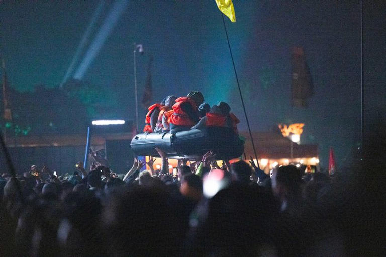 Banksy confirms Glastonbury Festival inflatable 'migrant' boat was his work