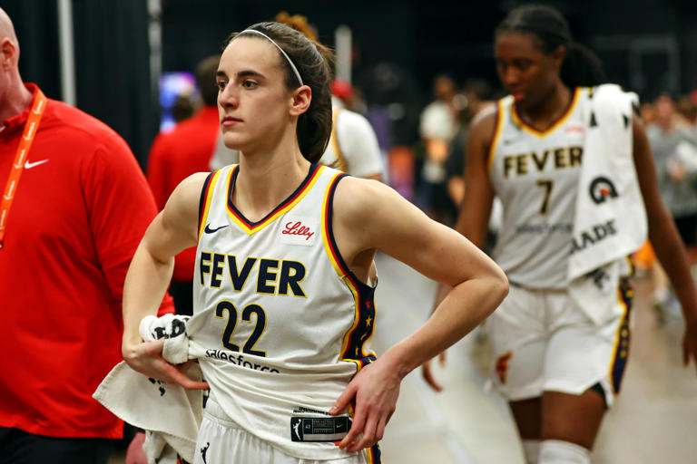 Indiana Fever guard Caitlin Clark walks off the court after the game against the Phoenix Mercury at Footprint Center on June 30, 2024. © Mark J. Rebilas-USA TODAY Sports