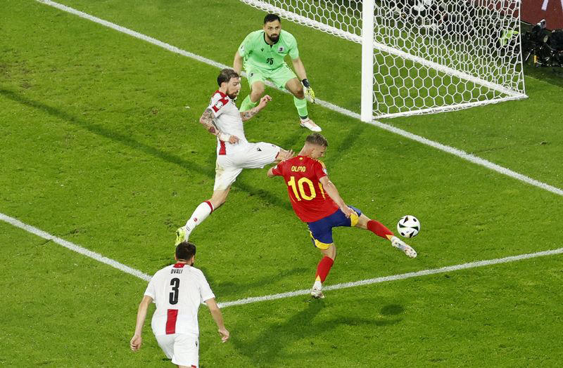 soccer-supreme spain reach euros last eight to shatter georgia dreams