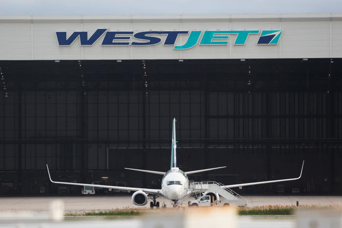 westjet strike over as mechanics union and airline reach tentative agreement