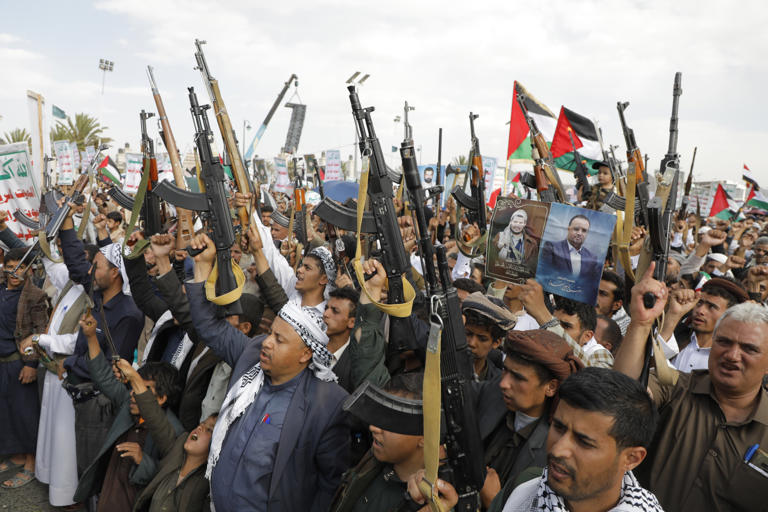 Houthi supporters attend anti-Israel and anti-U.S. protests in Sanaa, Yemen, on June 14, 2024. The organization has sought closer collaboration with Russia as it presses its campaign against Western shipping in the region.