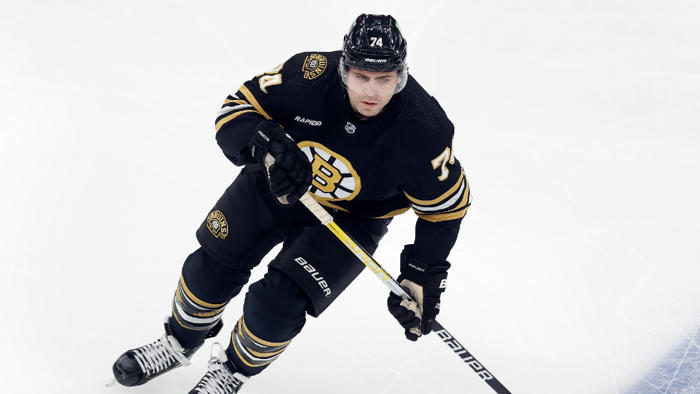 canucks sign jake debrusk to seven-year contract