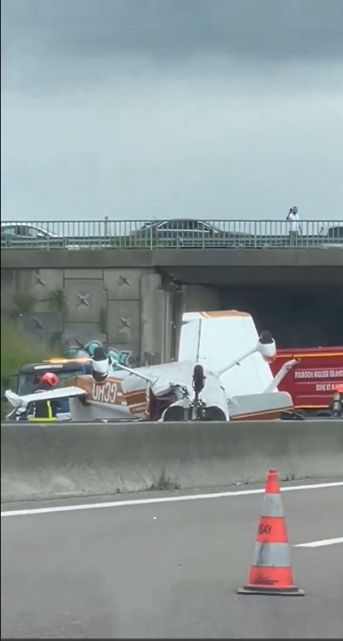 Plane crashes on French highway, killing three