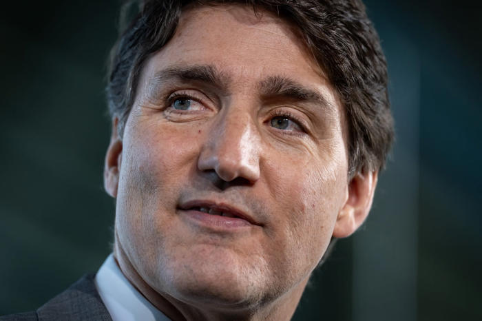 trudeau says he is 'committed' to staying as pm after byelection loss