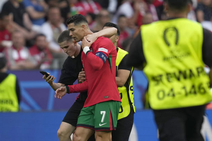 uefa fines its euro 2024 co-organizer germany over selfie-seekers on field with ronaldo