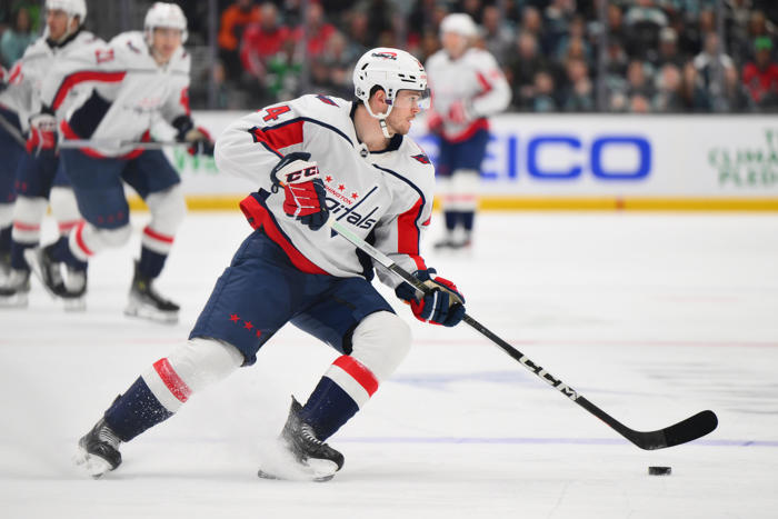 capitals re-sign former first-round pick