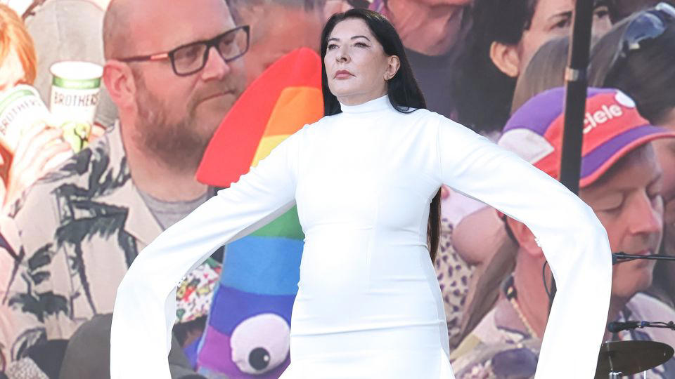 look of the week: an artist and her ‘peace’ dress silenced glastonbury for 7 minutes