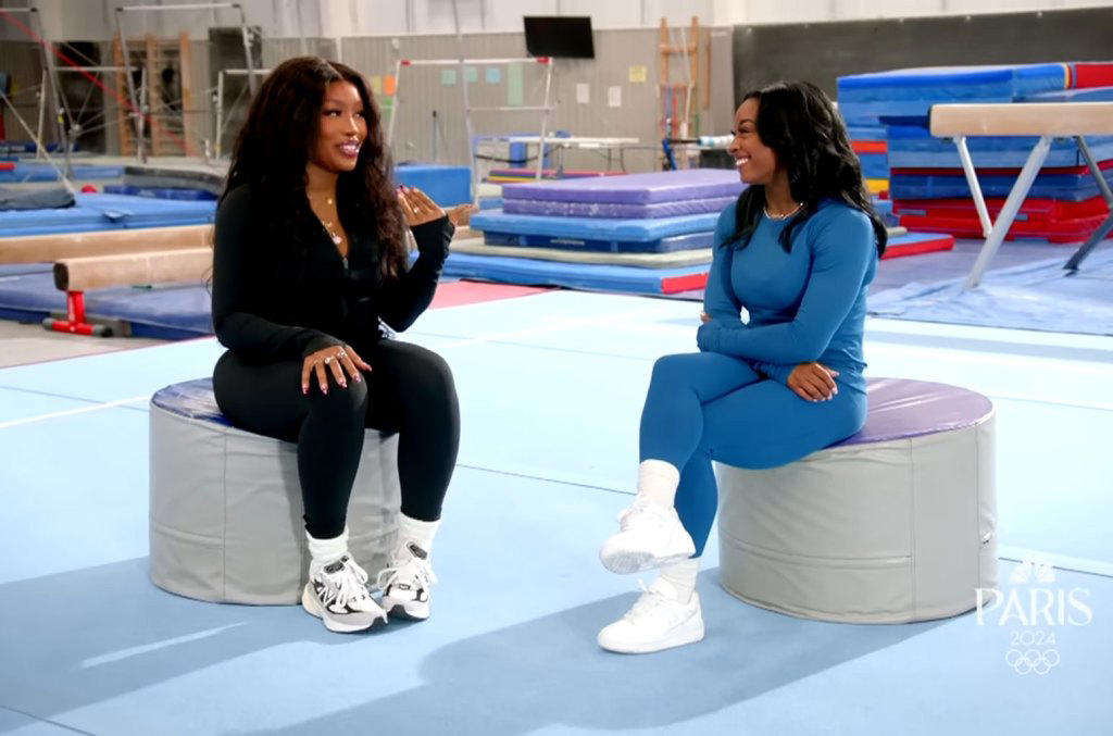 watch sza & simone biles have a handstand contest in olympics promo clip