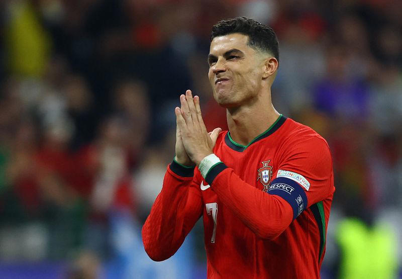 soccer-portugal into euro quarter-finals after shootout win over slovenia