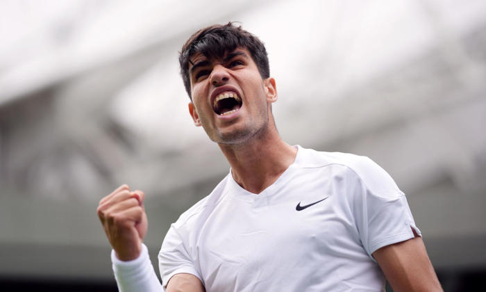 carlos alcaraz starts wimbledon defence with win over lively mark lajal