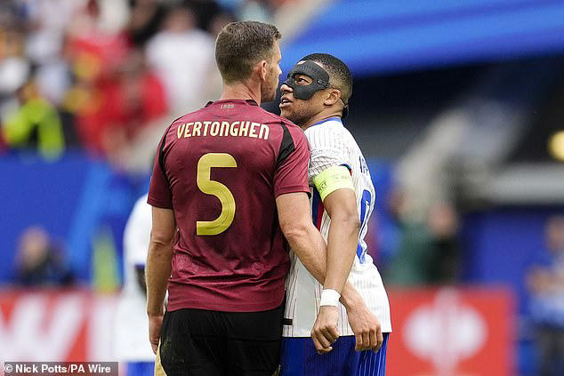 kylian mbappe celebrates in jan vertonghen's face minutes after heated exchange... after the belgian defender accused the france captain of diving during euro 2024 last-16 clash