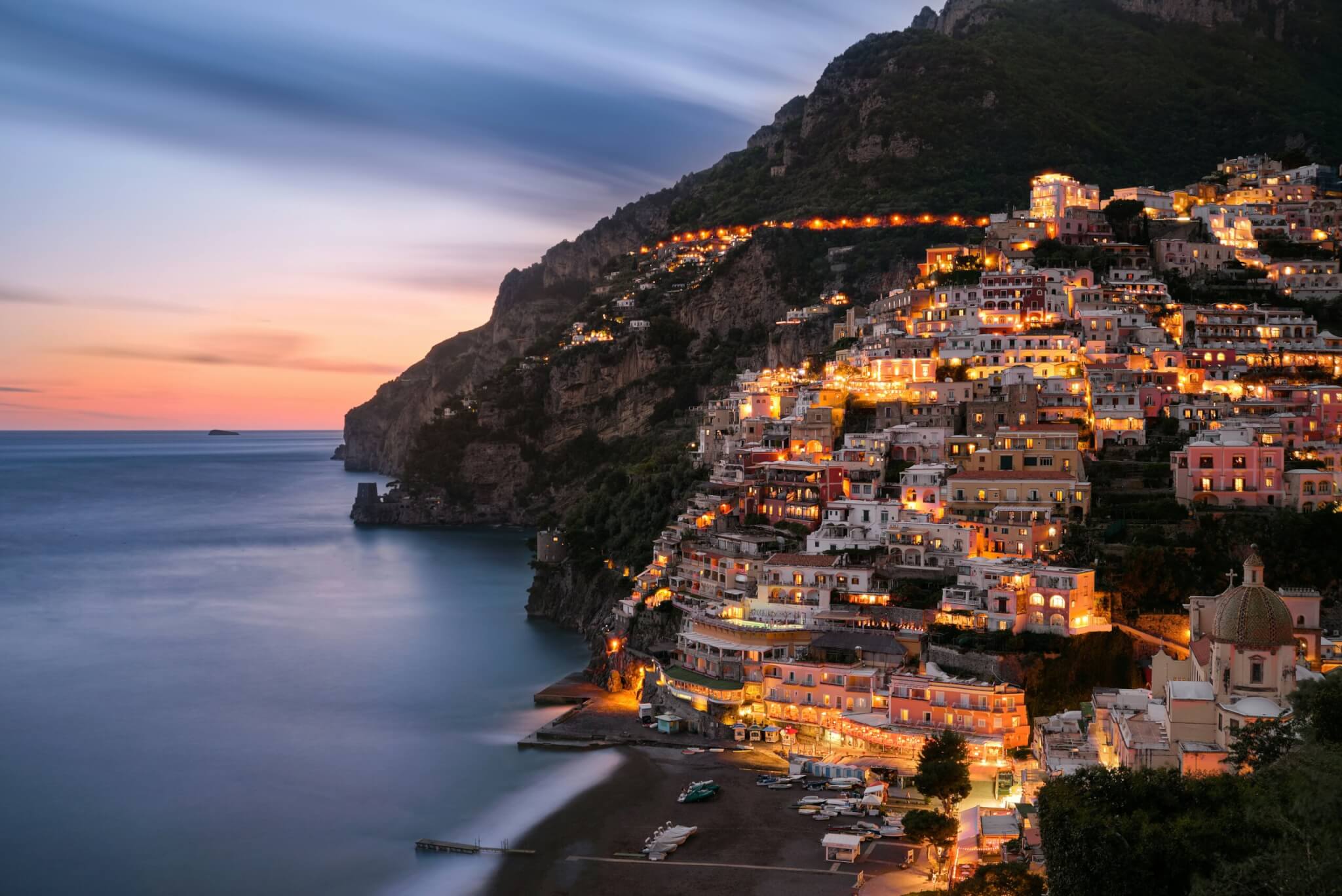 <p>While thoughts of the healing spray from the Mediterranean Sea still linger on your skin, you might want to return somewhere similar for your next milestone birthday – the Amalfi Coast. </p> <p>Imagine what a few nights in a luxury villa in Amalfi, Positano, or Ravello would do for your soul as you prepare to circle another year around the sun? Those rugged shorelines that are dotted with small beaches and pastel-colored fishing villages will live on in your mind forever. </p> <p>If your birthday happens to fall between May and September, these are some of the best months to visit because the crowds have dissipated, the rental options open up a little bit more, and you can commingle with the locals in a way you can't when peak season is in full bloom. </p>