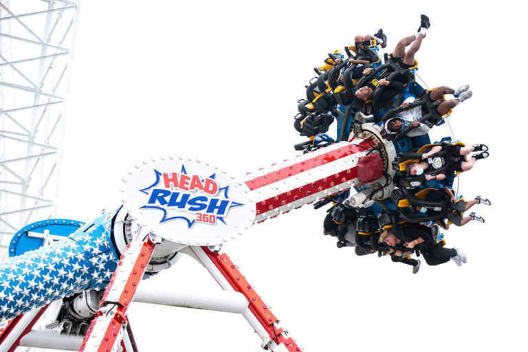 Iowa and Kentucky players take a spin on the Head Rush ride during their day off before the Citrus Bowl football game, Thursday, Dec. 30, 2021, at Fun Spot America in Orlando, Fla.
