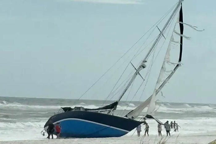 'ghost ship' washes ashore on florida beach one week after it was abandoned at sea amid storms