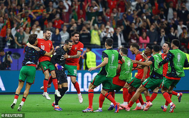 Tears to cheers! Portugal beat Slovenia on penalties to reach Euro 2024 quarter-finals... after Cristiano Ronaldo missed in extra-time