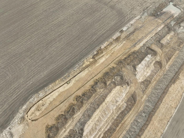 archaeologists unearth 600-foot prehistoric monument during highway dig