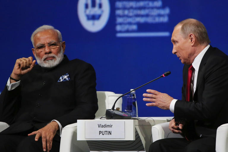Vladimir Putin, right, and Narendra Modi in St. Petersburg in 2017.