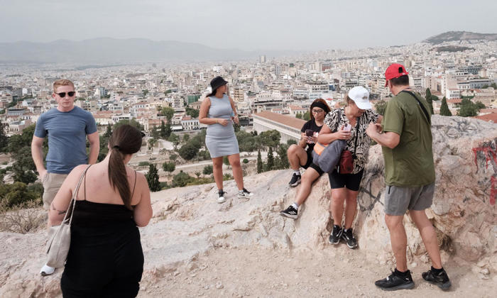 ‘my escape is going north’: heatwaves begin to drive tourists in europe to cool climes