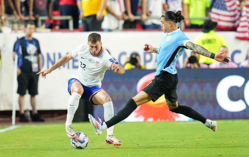 soccer-uruguay into copa america quarters, knock out hosts us with 1-0 win