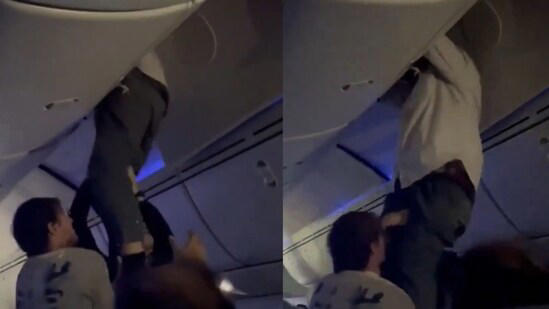 watch: passenger rescued from overhead bin after severe turbulence on air europa flight