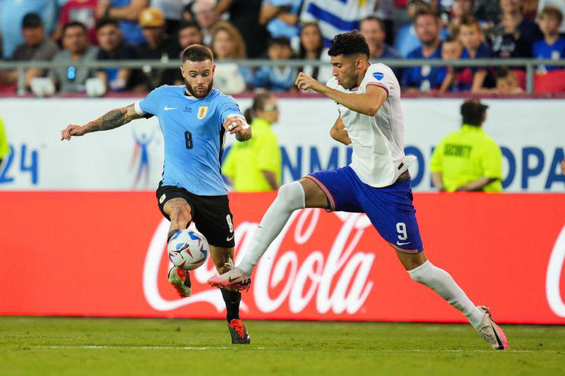 soccer-uruguay into copa america quarters, knock out hosts us with 1-0 win