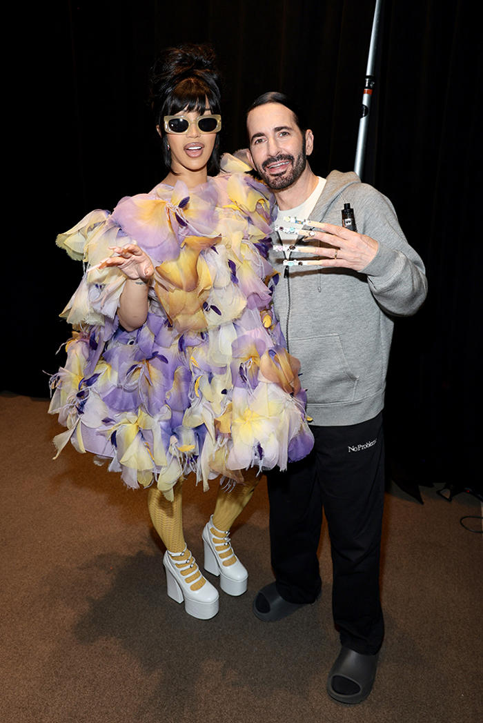 cardi b steps out in feathery dress and platform ‘kiki' boots to help marc jacobs spread some fashion joy at his nyc show