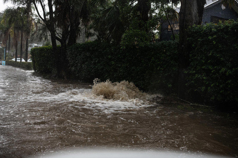 northern beaches suburbs cut off after massive ‘tropical’ downpour
