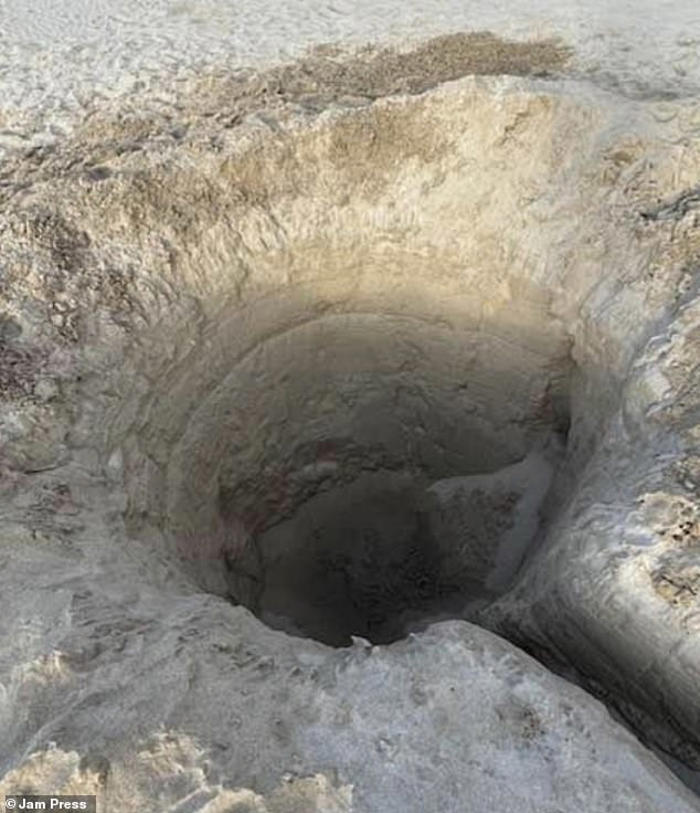 mystery 8ft sand hole dug by hand appears on poldark beach