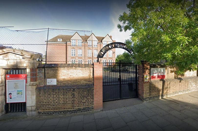 school headteacher awarded £100,000 after being sacked for tapping own son's hand