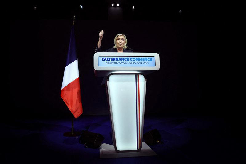 french candidates bow out in bid to block far-right