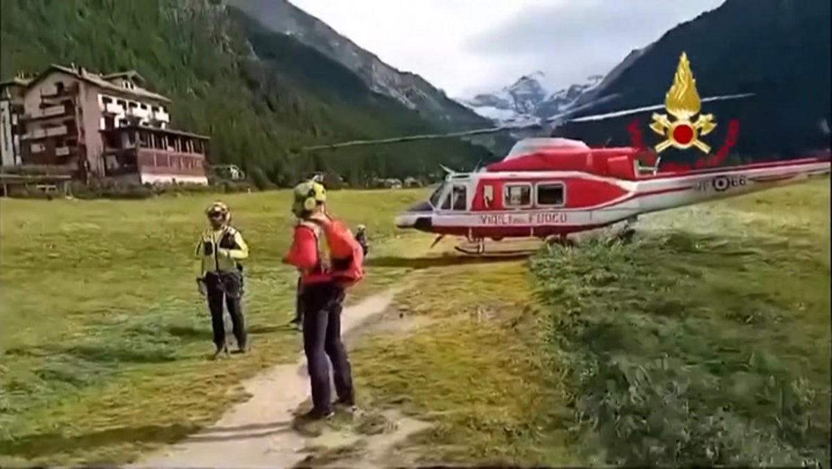 hundreds evacuated by helicopters from isolated italian alpine town after flash flood