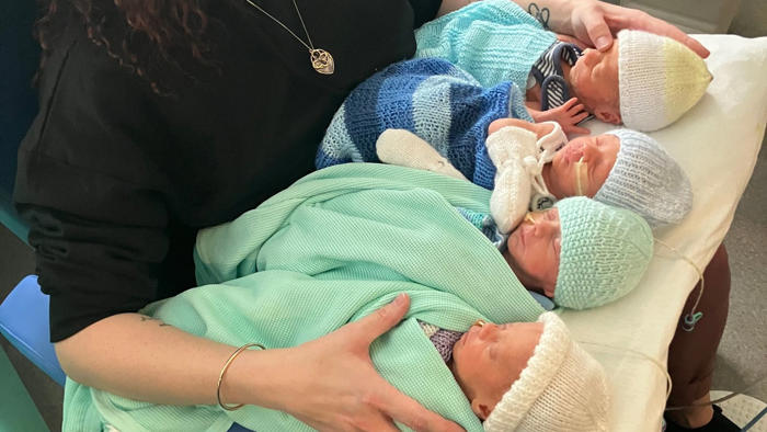 the mitchell brothers: couple celebrate rare one in 700,000 birth of quadruplets