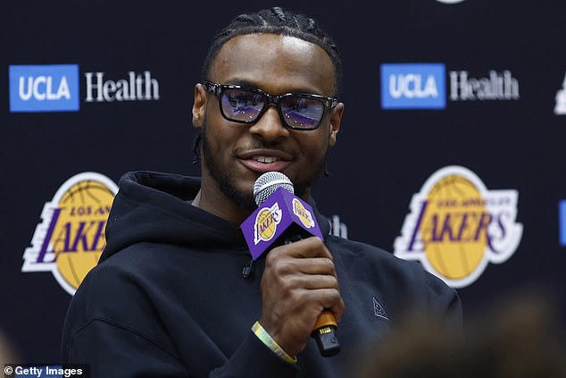 bronny james 'wasn't handed anything,' insists lakers head coach jj redick after nba rookie was drafted by his famous dad lebron's team