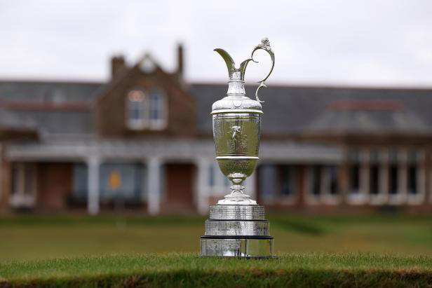 TROON, SCOTLAND - APRIL 30: The Claret Jug sits in front of the clubhouse during media day for the The 152nd Open Championship at Royal Troon on April 30, 2024 in Troon, Scotland. (Photo by Richard Heathcote/R&A/R&A via Getty Images)