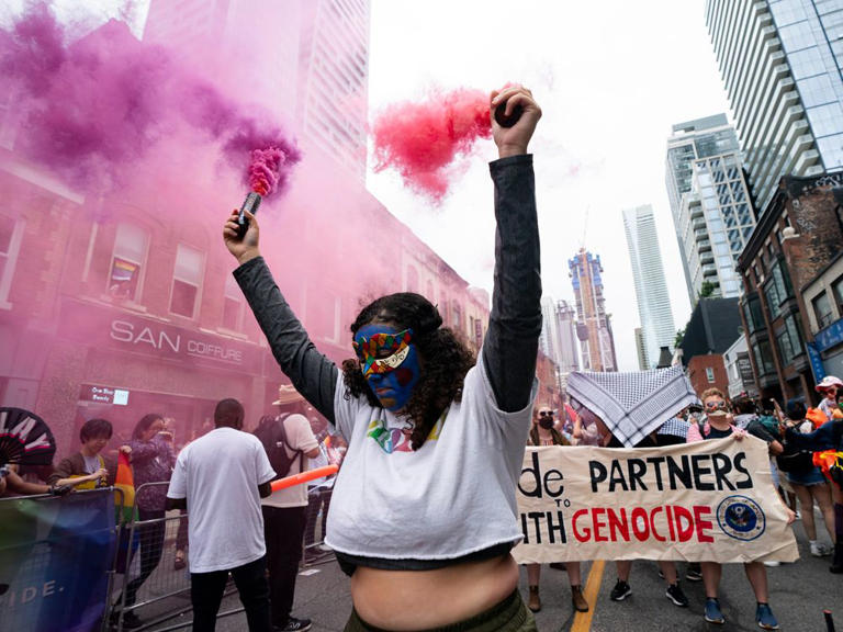 Anti-Israel protesters disrupt the Toronto Pride Parade, on Sunday, June 30, 2024.