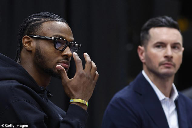 bronny james 'wasn't handed anything,' insists lakers head coach jj redick after nba rookie was drafted by his famous dad lebron's team