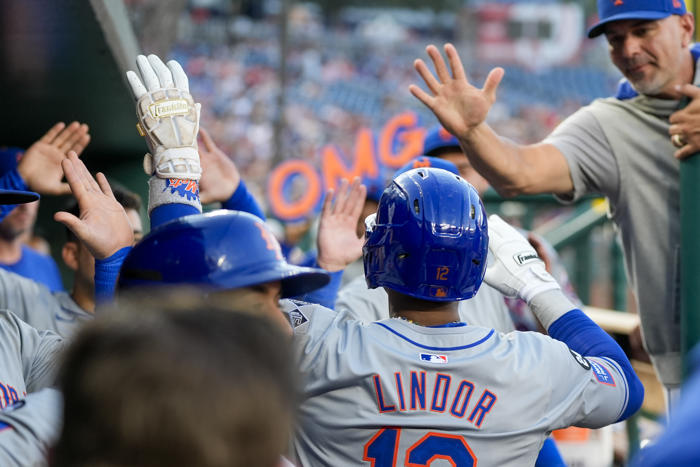 nimmo returns from hotel room scare to drive in 2 runs as the mets beat the nationals 7-2 in 10