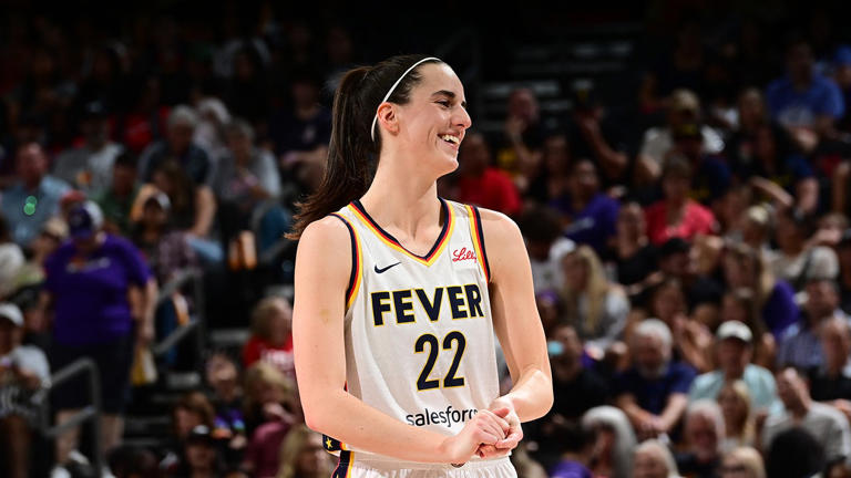 Caitlin Clark #22 of the Indiana Fever smiles during the game against the Phoenix Mercury on June 30, 2024 at Footprint Center in Phoenix, Arizona. Getty Images