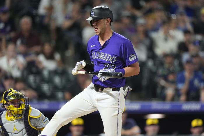 rhys hoskins hit by pitch with bases loaded in 9th inning, brewers beat rockies 4-3