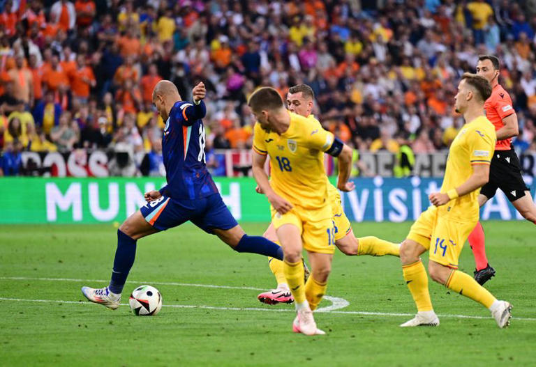 FILE PHOTO: Soccer Football - Euro 2024 - Round of 16 - Romania v Netherlands - Munich Football Arena, Munich, Germany - July 2, 2024 Netherlands' Donyell Malen scores their third goal REUTERS/Angelika Warmuth