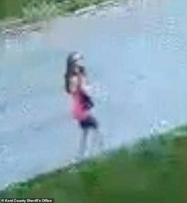 Surveillance footage shows girl walking down street before vanishing