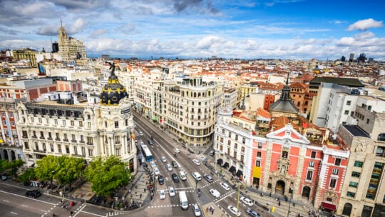 <p>Madrid, the capital of Spain, is full of energy and charm. Take a stroll through the beautiful Retiro Park, admire the stunning architecture at Plaza Mayor, and indulge in tapas and sangria at one of the city’s many restaurants.</p><p>Madrid also has a thriving art scene, with world-renowned museums like the Prado and Reina Sofia. And don’t forget to catch a football match at the iconic Santiago Bernabeu stadium.</p><p>With its vibrant culture, delicious food, and lively atmosphere, Madrid is a must-visit destination for any traveler.</p>