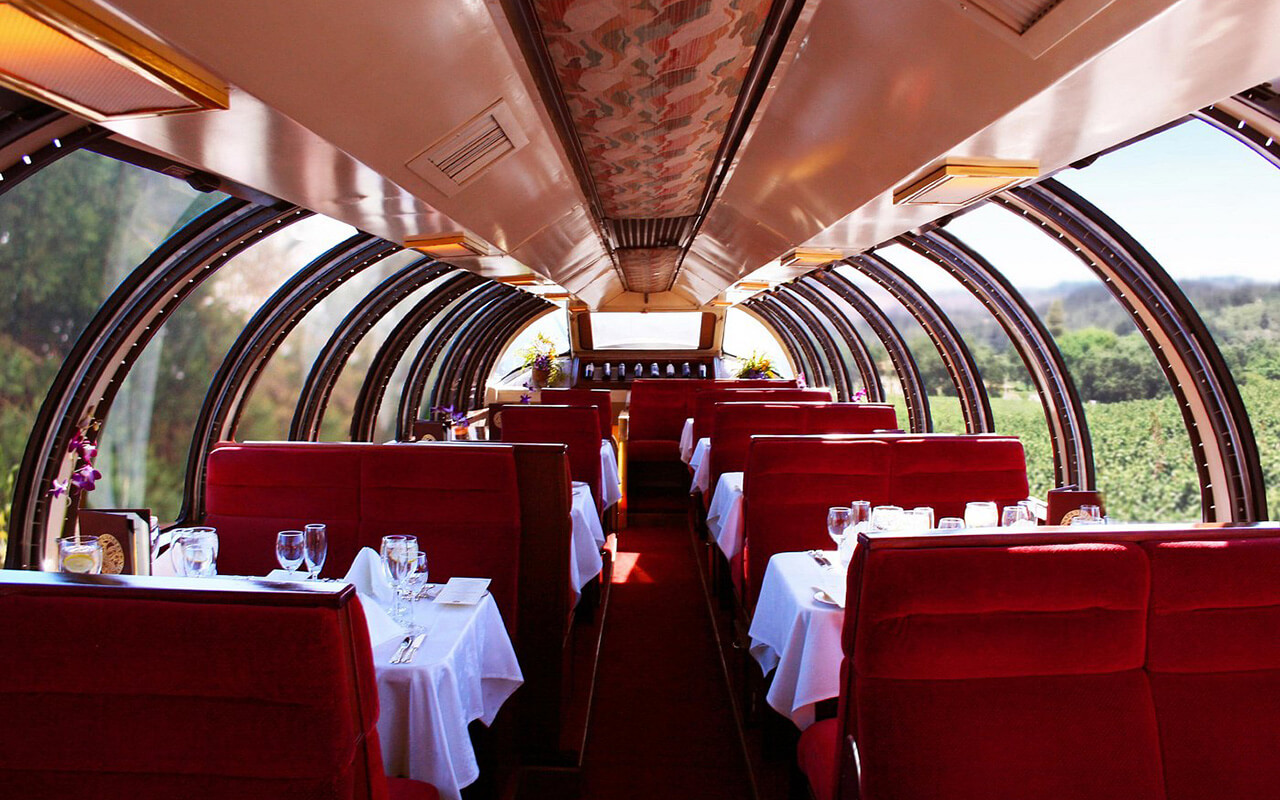 <p>The Napa Valley Wine Train combines the elegance of train travel with wine tasting. The three-hour journey from Downtown Napa to St. Helena includes sipping varietals from vineyards like Castello Di Amorosa and Sequoia Grove. Enjoy picturesque views and gourmet meals with options for special experiences like murder mystery dinners.</p>