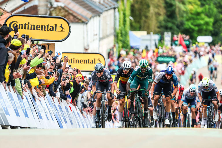 Biniam Girmay (in green, third from right) sprints tot he finish of Stage 8 of the Tour de France at Colombey-les-Deux-Eglises, France.