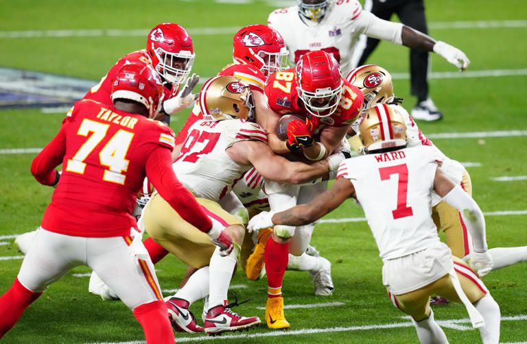 Feb 11, 2024; Paradise, Nevada, USA; Kansas City Chiefs tight end Travis Kelce (87) catches a pass against the San Francisco 49ers during overtime in Super Bowl LVIII at Allegiant Stadium. Mandatory Credit: Stephen R. Sylvanie-USA TODAY Sports