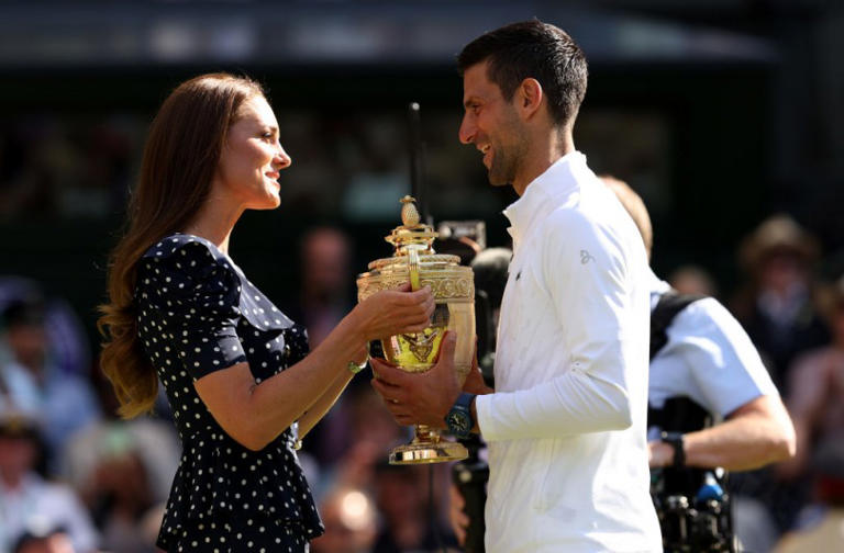 Catherine, Duchess of Cambridge hands over the trophy to winner Novak Djokovic of Serbia following his victory against Nick Kyrgios of Australia during their Men's Singles Final match on day 14 of The Championships Wimbledon 2022 at All England Lawn Tennis and Croquet Club on July 10, 2022 in London, England (Photo : Clive Brunskill/Getty Images)