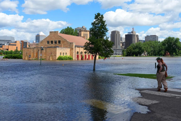 Floodwaters approached the Clarence W. Wigington Pavilion in St. Paul's Harriet Island Regional Park last month, but organizers say the park will be in good shape for Minnesota Yacht Club.
