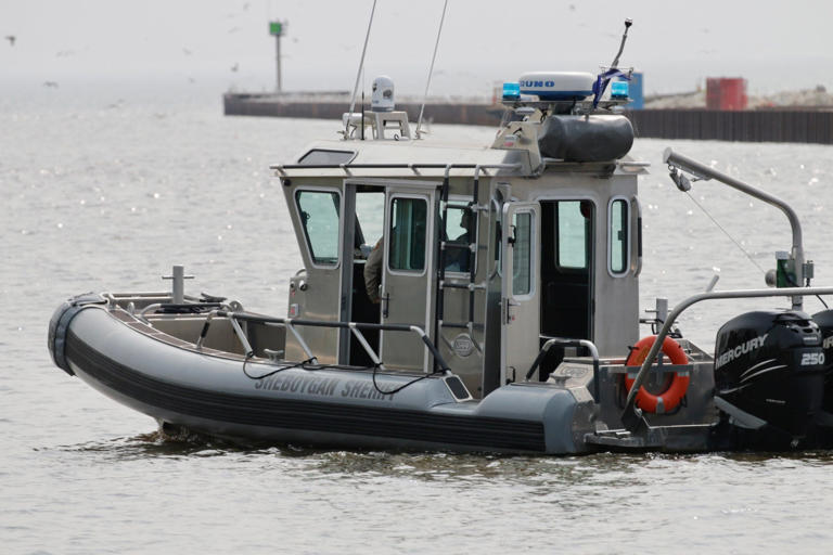 A Sheboygan County Sheriff's rescue boat on Tuesday morning, May 16, 2023, looks for a person who was believed to have jumped into the Sheboygan River near Rotary Riverview Park Monday evening, May 15, 2023.